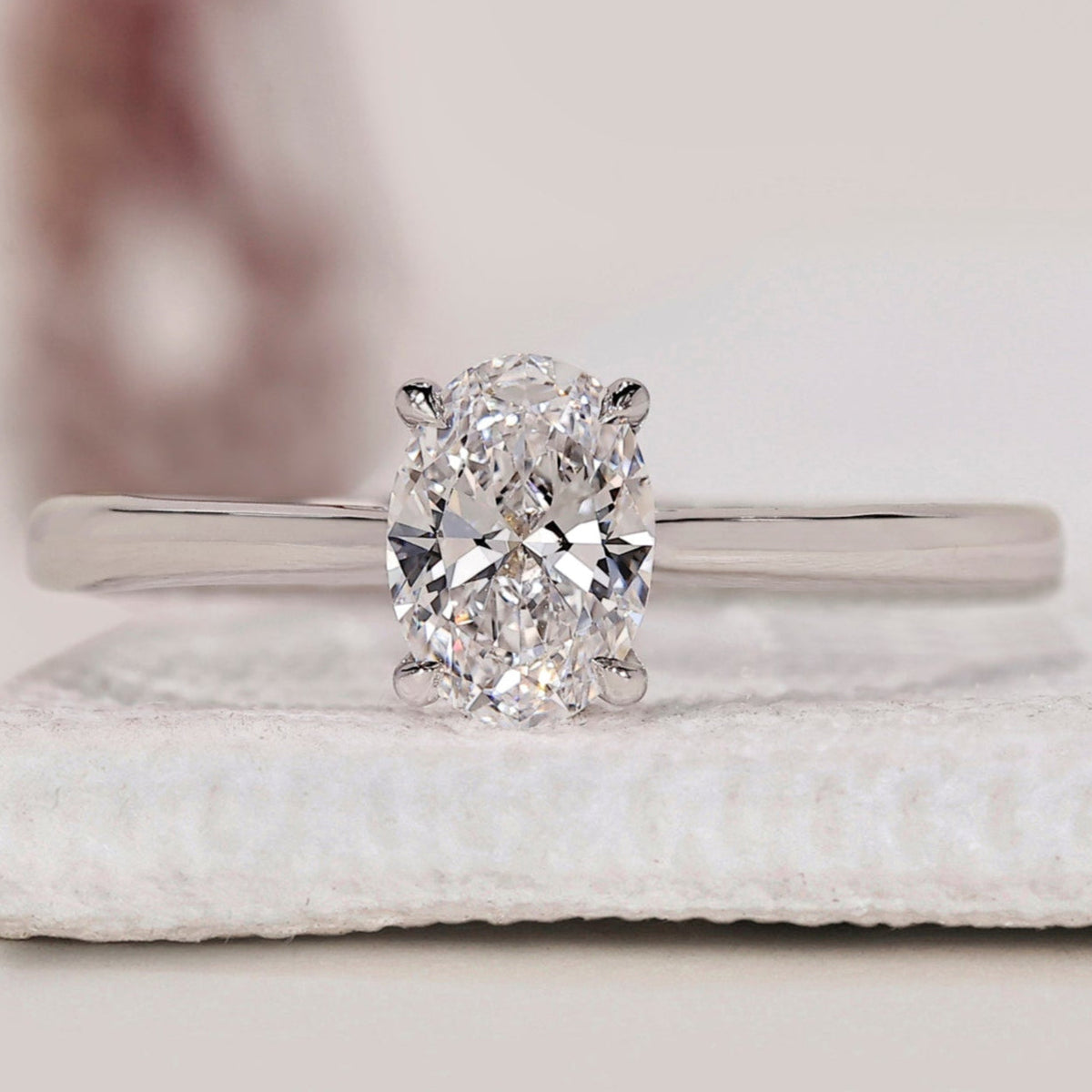 Solitaire Oval Cut Diamond Ring with Cathedral Setting
