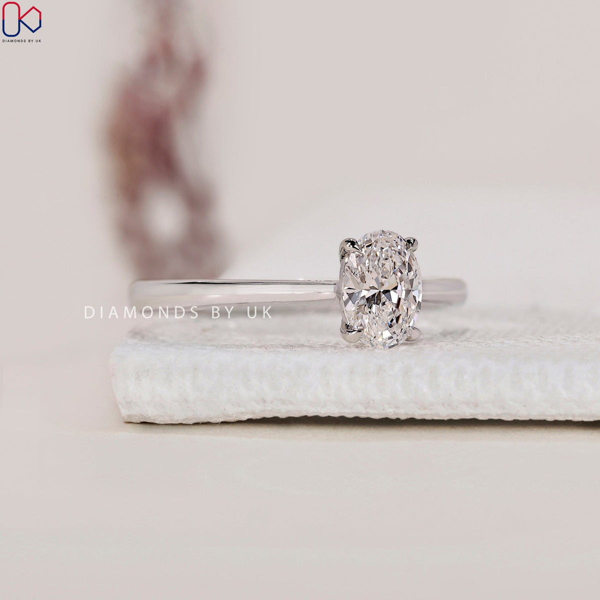 Solitaire Oval Cut Diamond Ring with Cathedral Setting