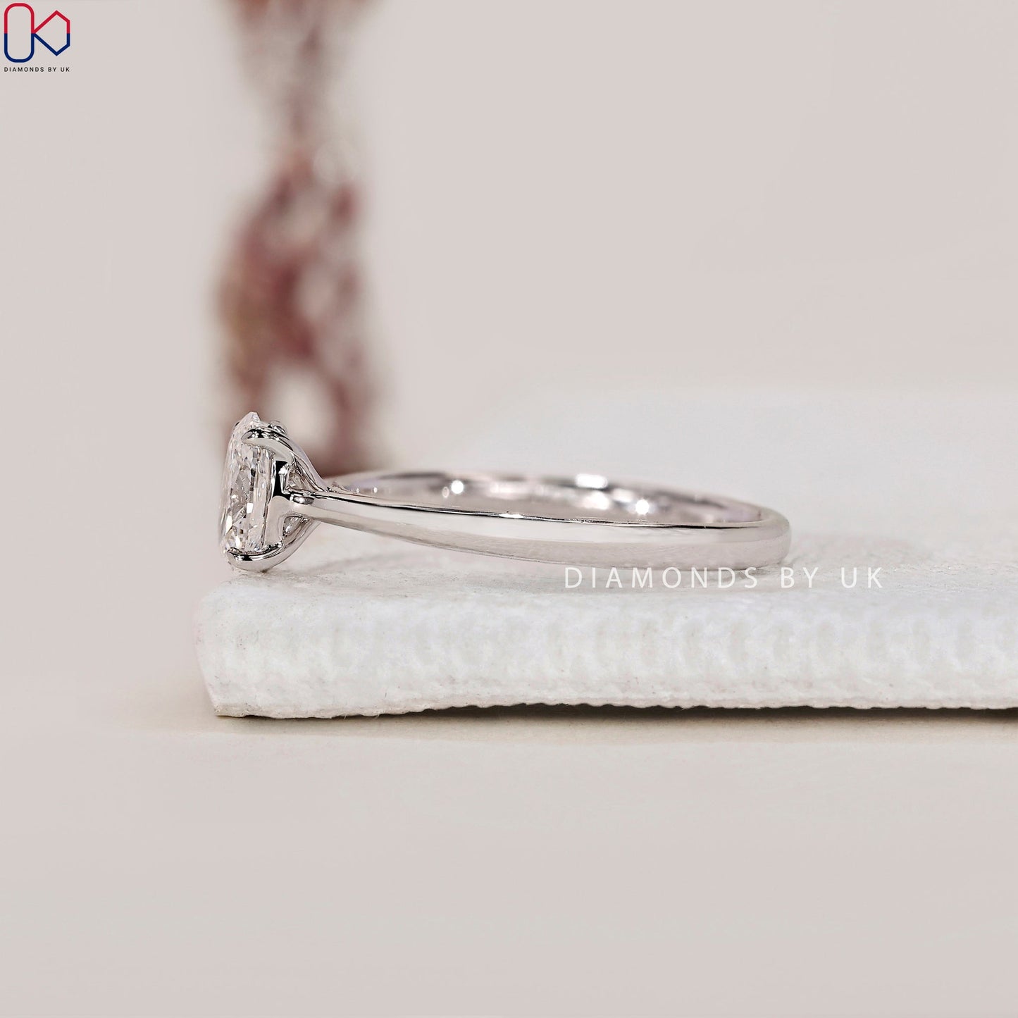 Solitaire Oval Cut Diamond Ring with Cathedral Setting