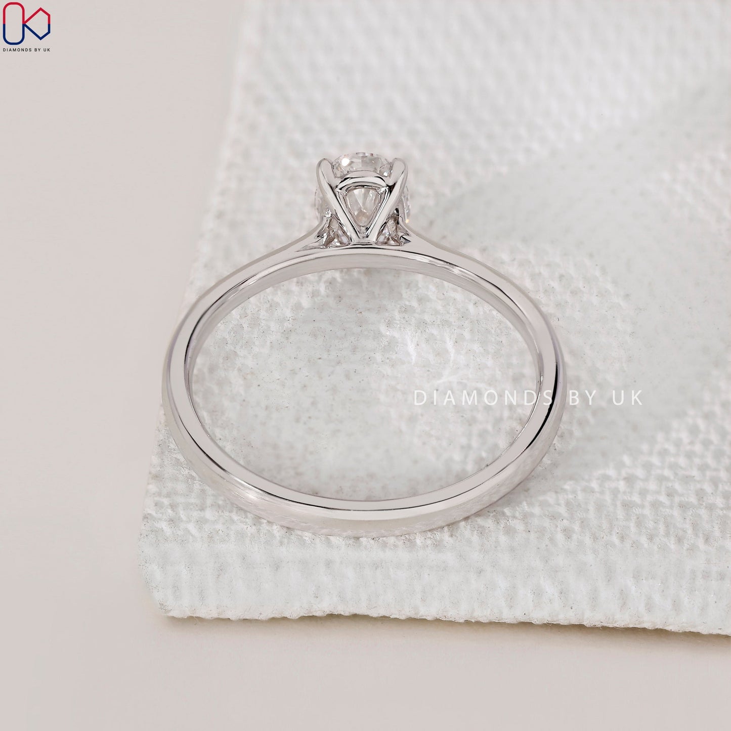 Solitaire Oval Cut Diamond Ring with Cathedral Setting