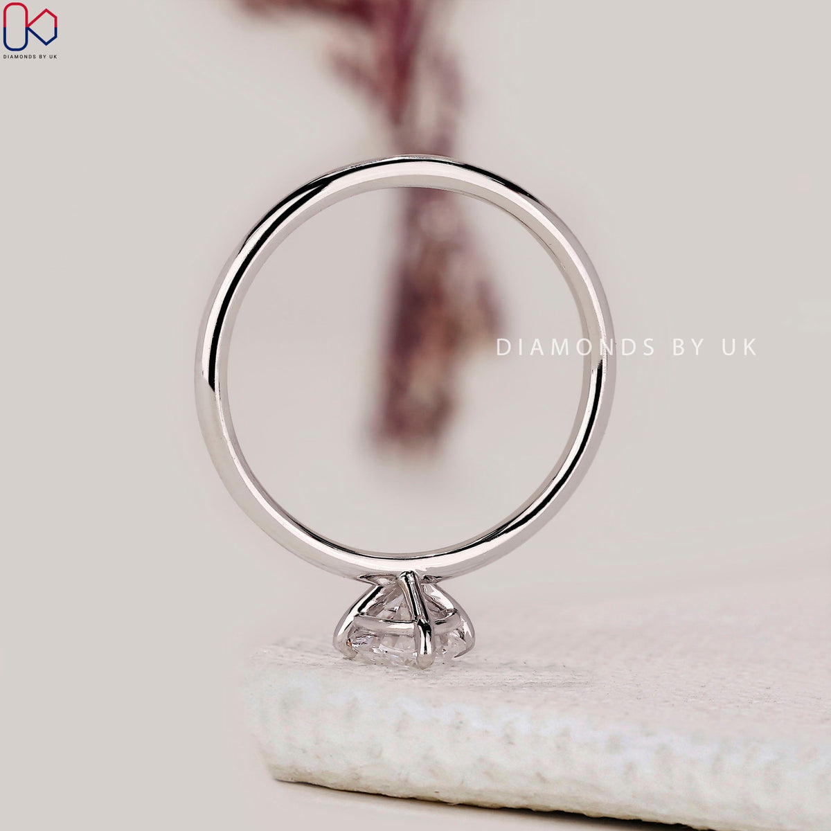 Oval Solitaire Engagement Ring In White Gold