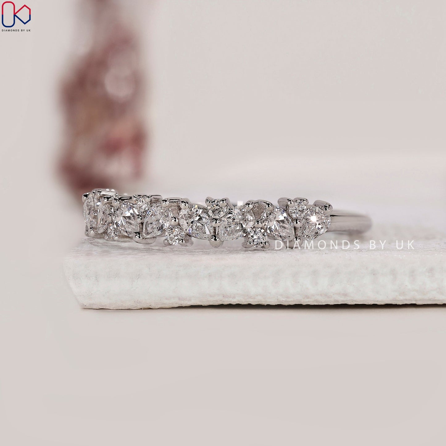 Pear And Round Wedding Band In White Gold