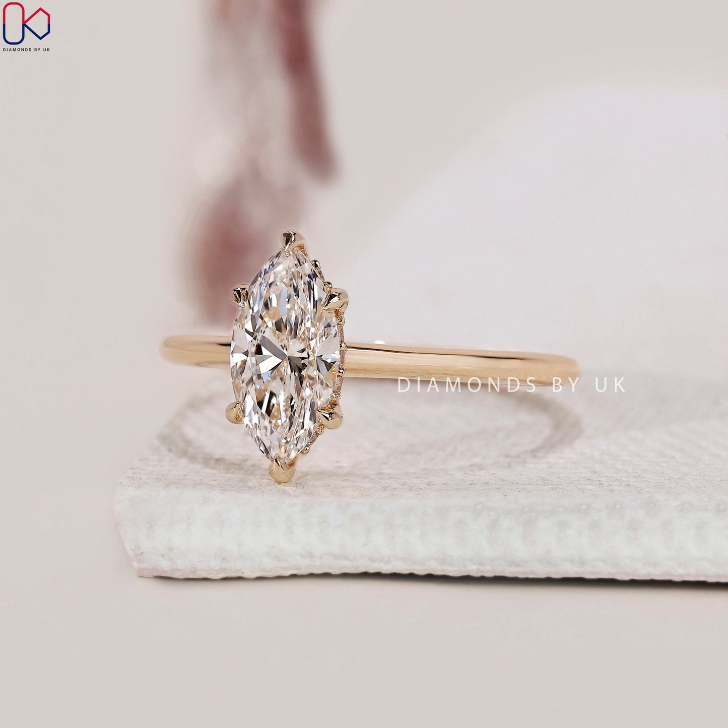 Marquise Cut Diamond Ring In Hidden Halo Setting