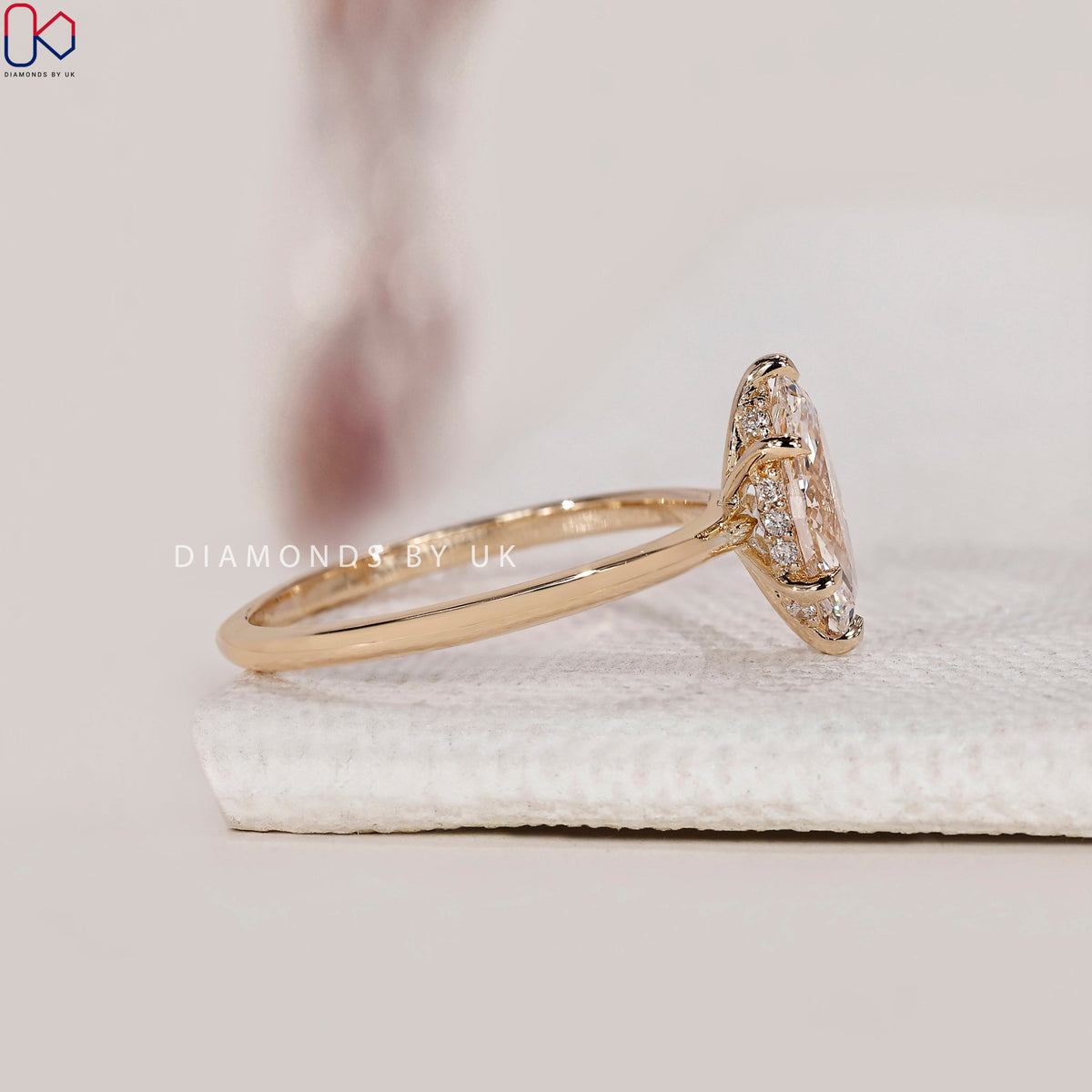Marquise Cut Diamond Ring In Hidden Halo Setting