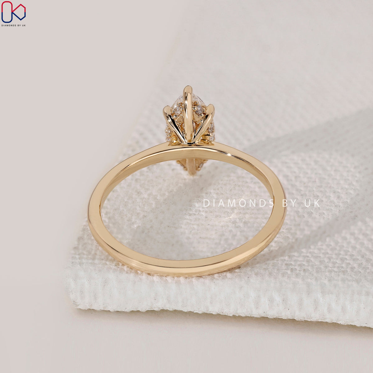 Marquise Cut Diamond Ring In Hidden Halo Setting