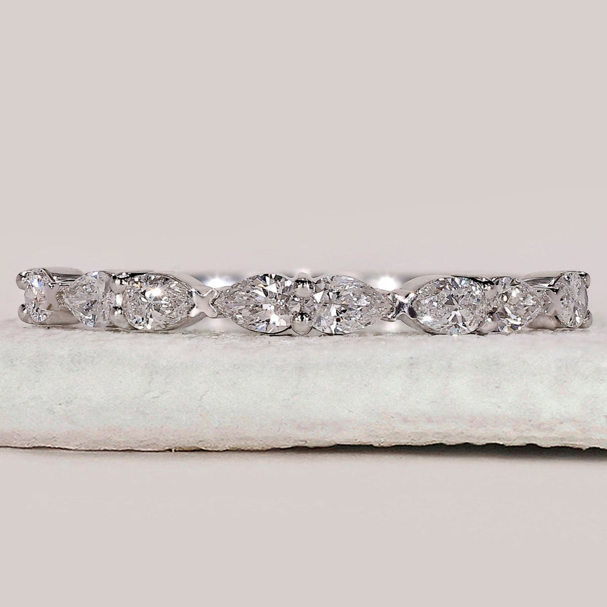 East To West Setting Pear Shaped Diamond Band