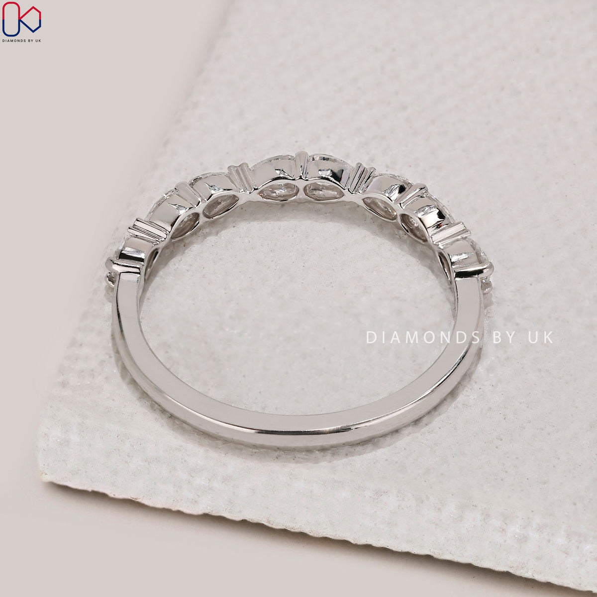 East To West Setting Pear Shaped Diamond Band