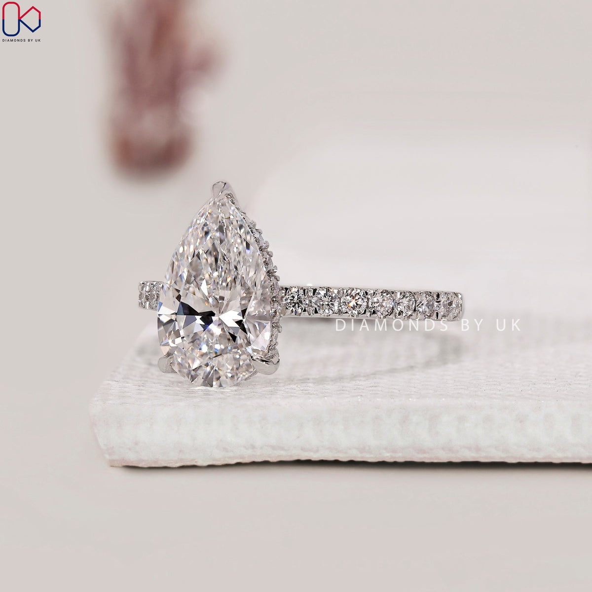 Pear Cut Hidden Halo Engagement Ring