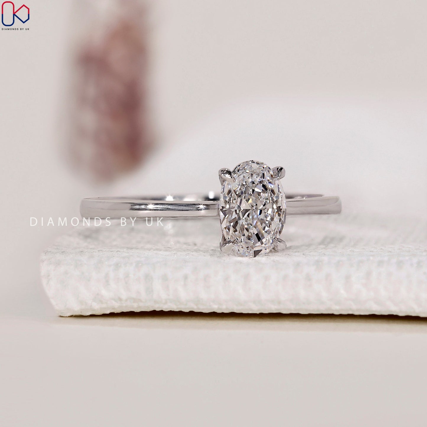 White Gold Oval Solitaire Engagement Ring