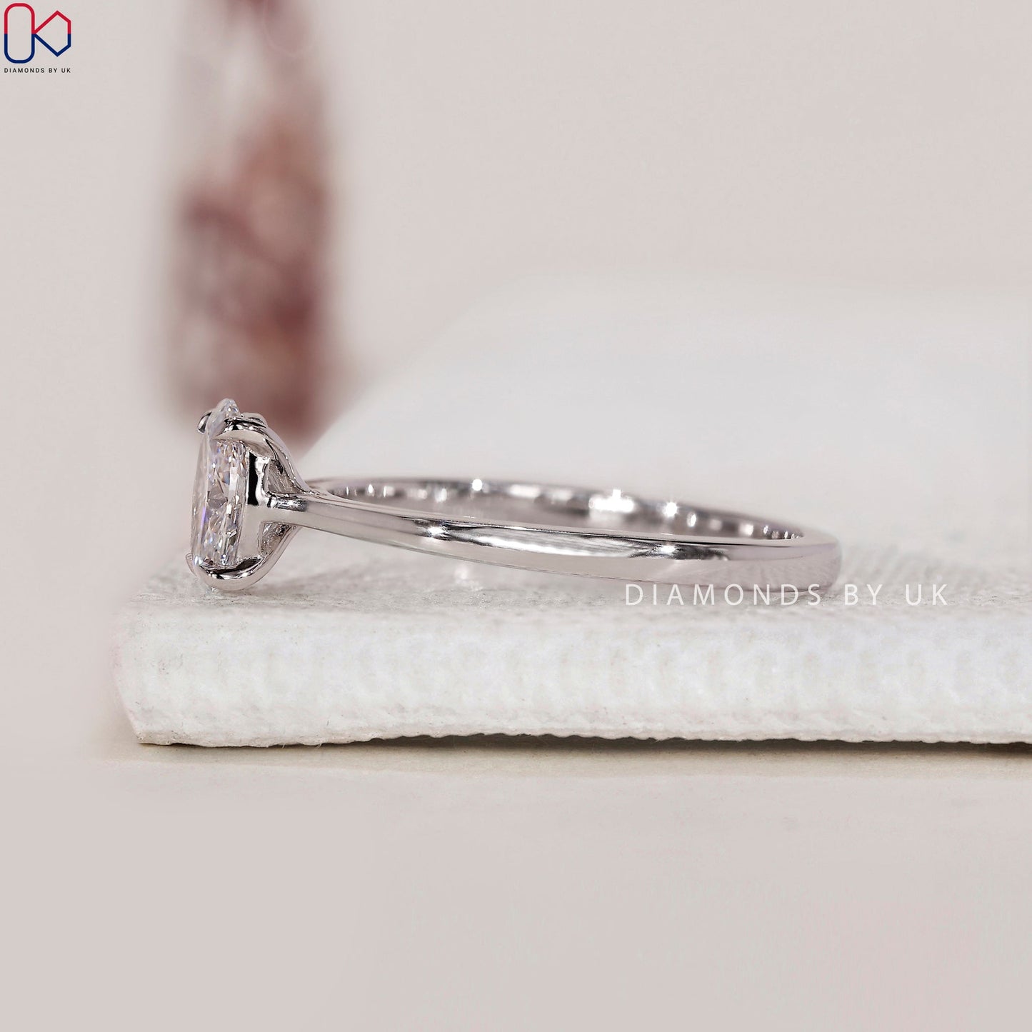 White Gold Oval Solitaire Engagement Ring