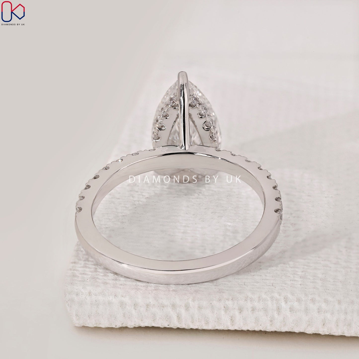 Pear Cut Hidden Halo Engagement Ring