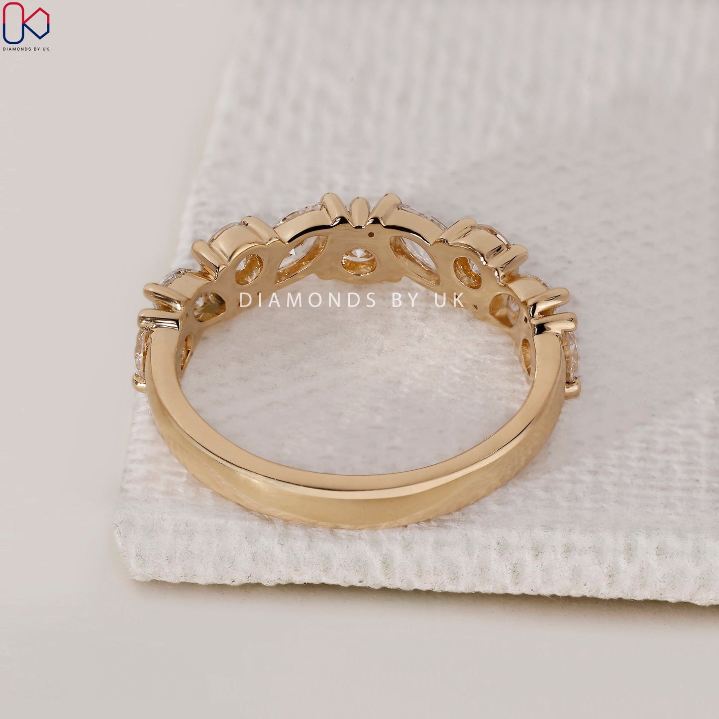 Marquise And Round Band In Half Eternity Style