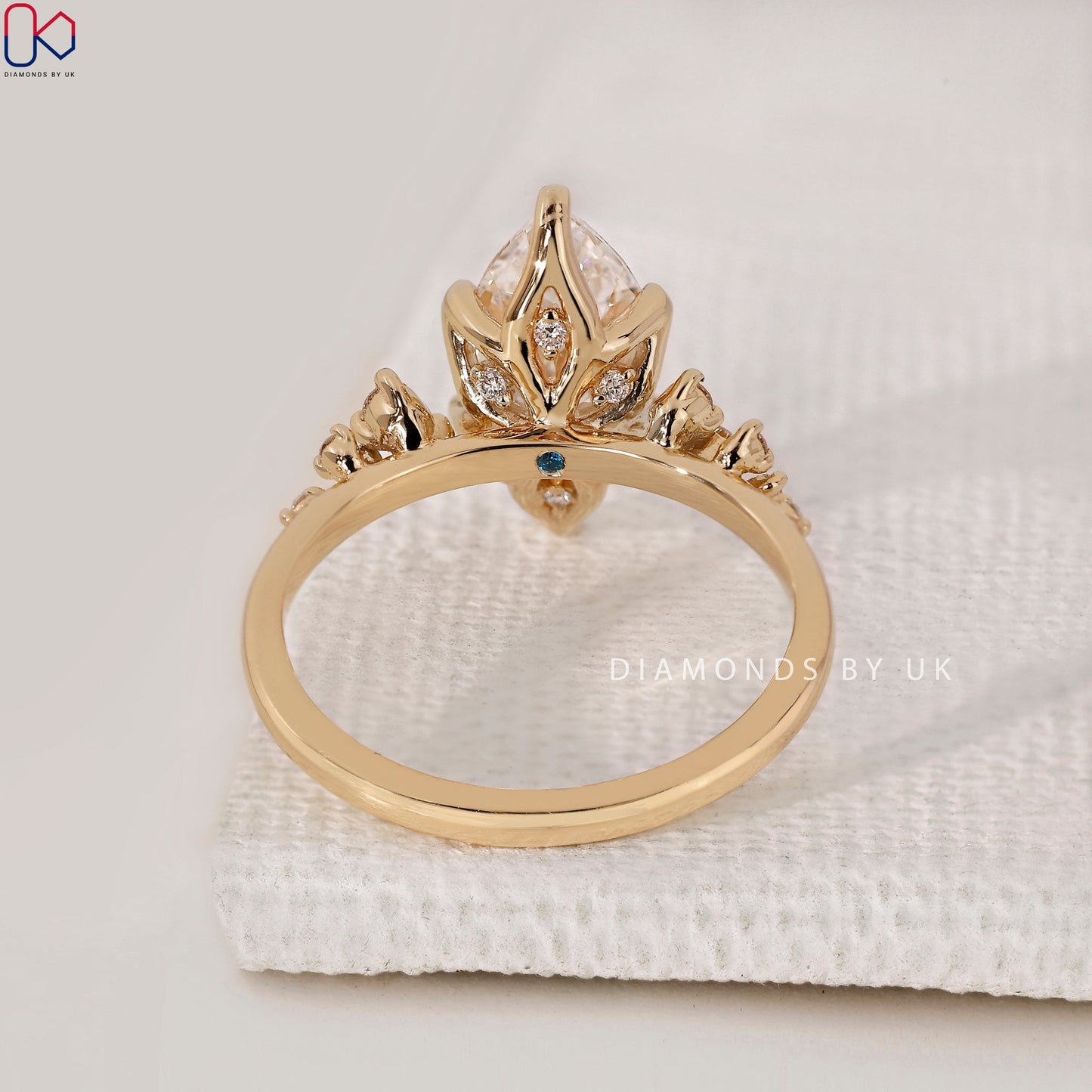 Yellow Gold Marquise Engagement Ring with Side Stone