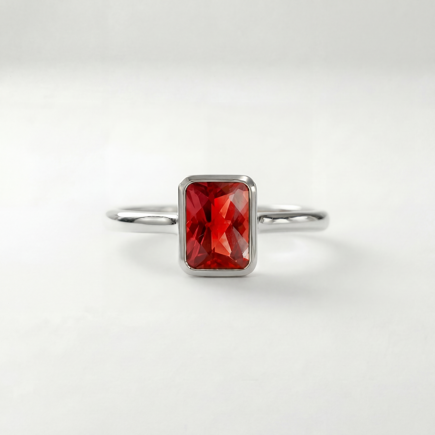 The Classic Bezel Ring | Lab-Grown Orange Sapphire