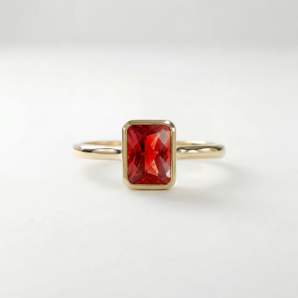 The Classic Bezel Ring | Lab-Grown Orange Sapphire