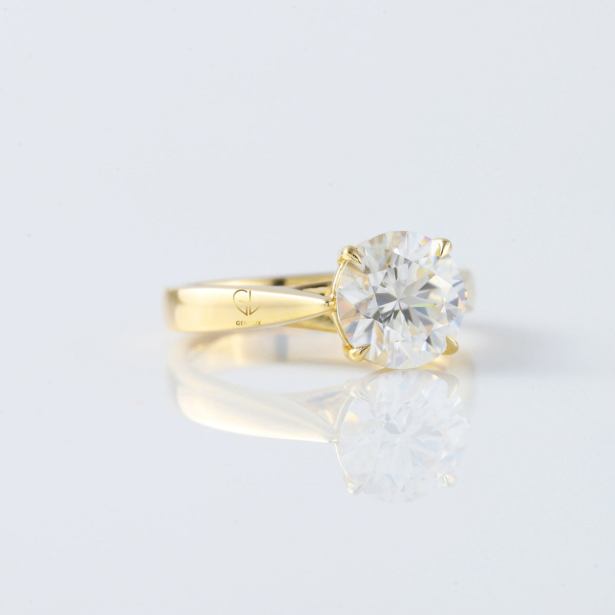 Pinch Style Round Moissanite Solitaire Engagement Ring