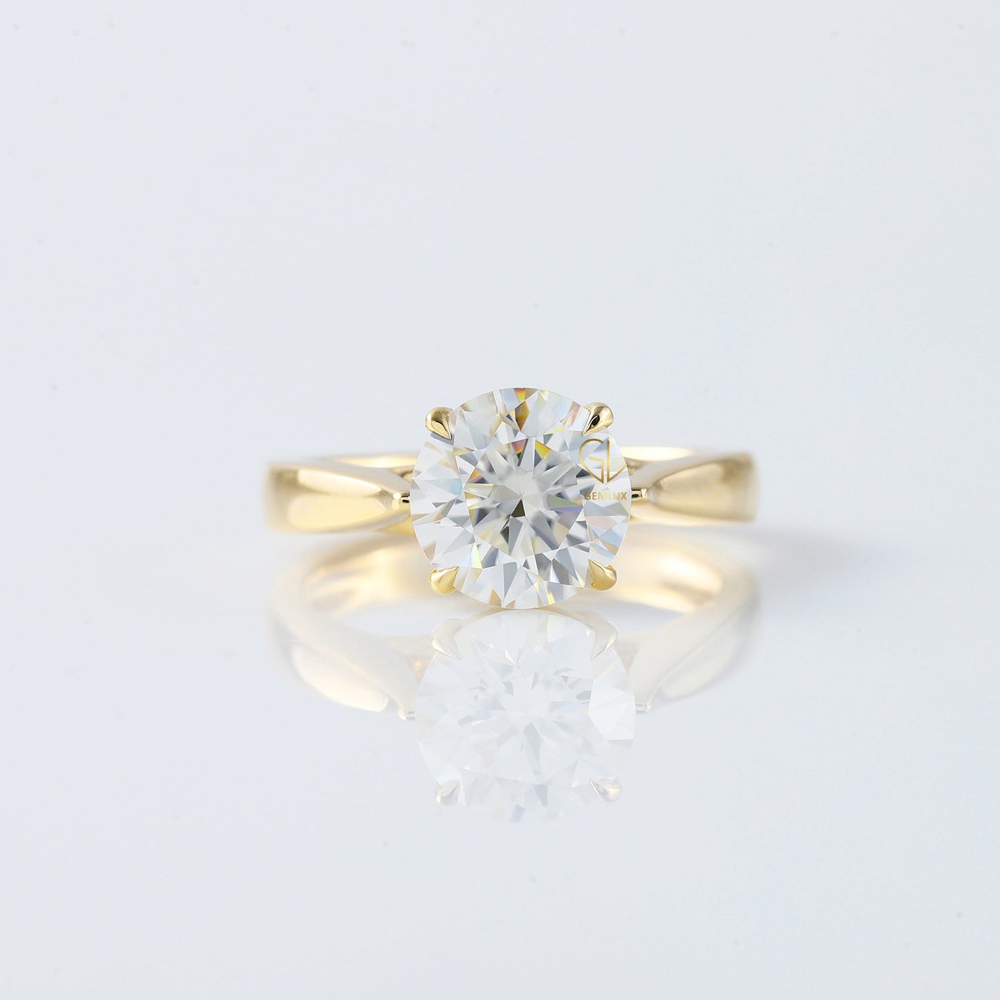 Pinch Style Round Moissanite Solitaire Engagement Ring