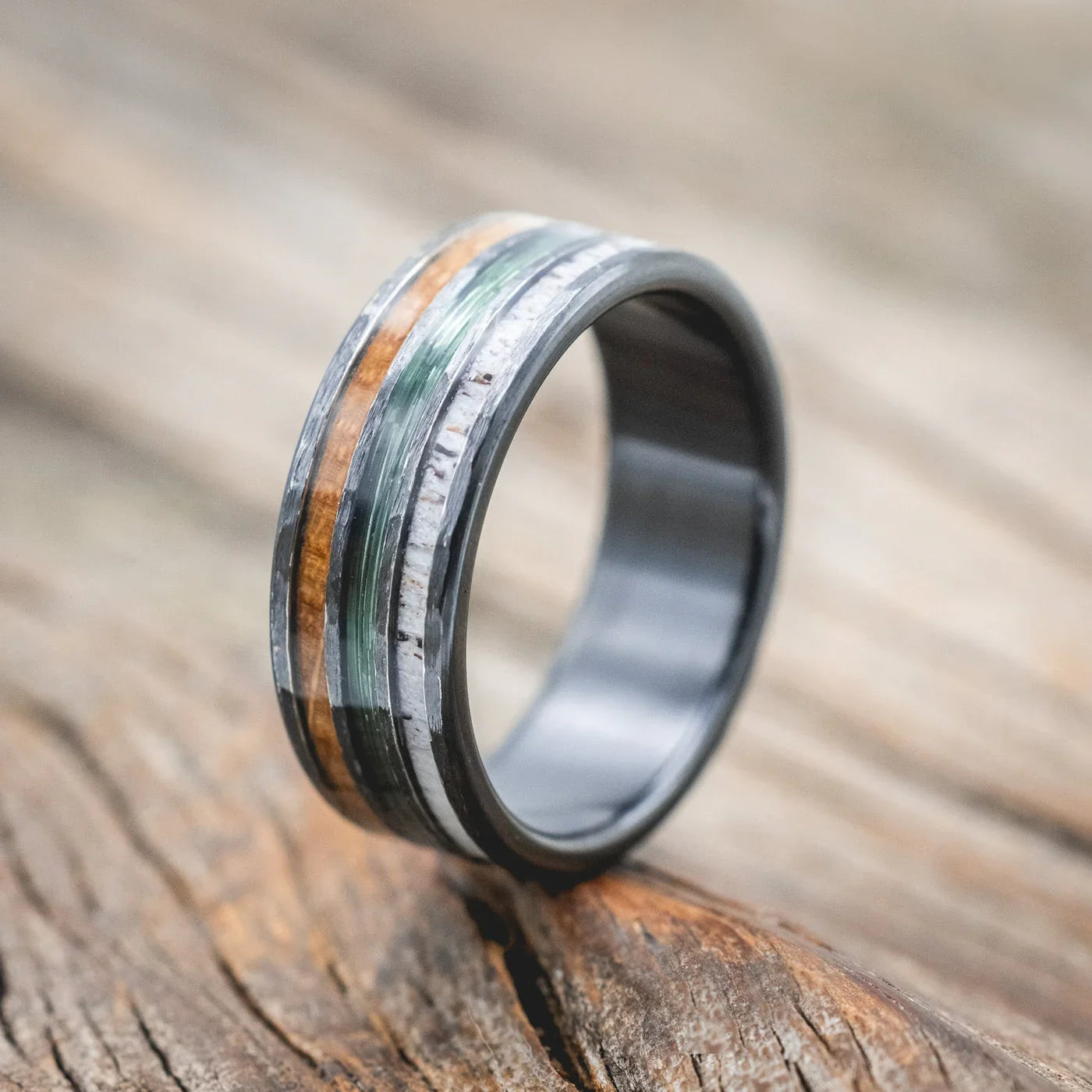 "Rio" - Antler, Green Mono Fishing Line, And Whiskey Barrel Oak Wedding Band With A Hammered Finish - Black Zirconium (8mm) - Size 10 1/2