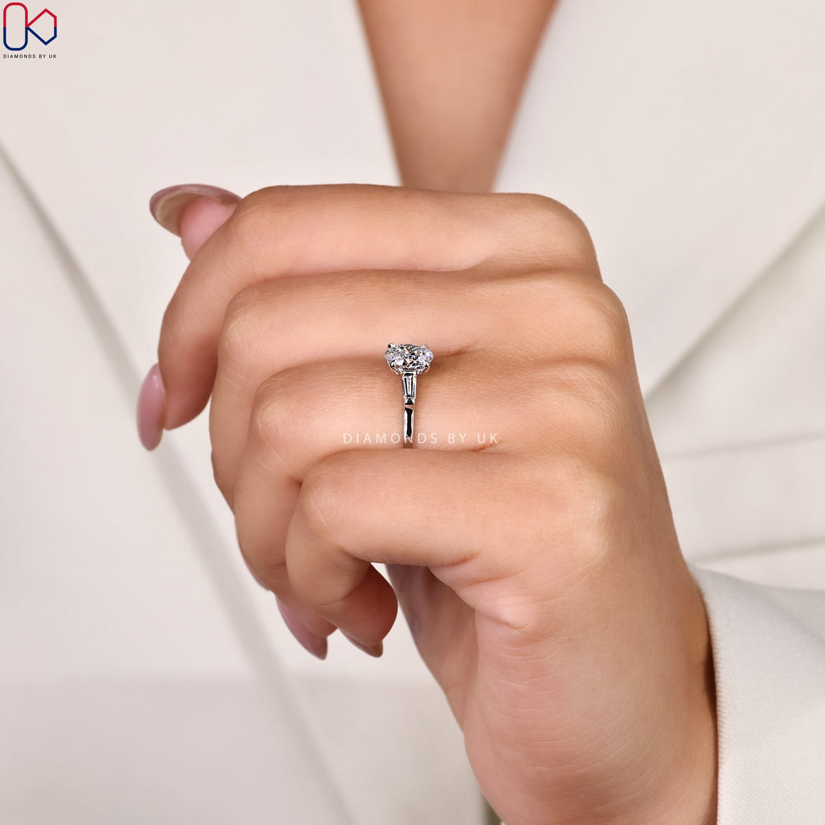 3 Stone Diamond Ring With Oval And Tapered Baguette Stone