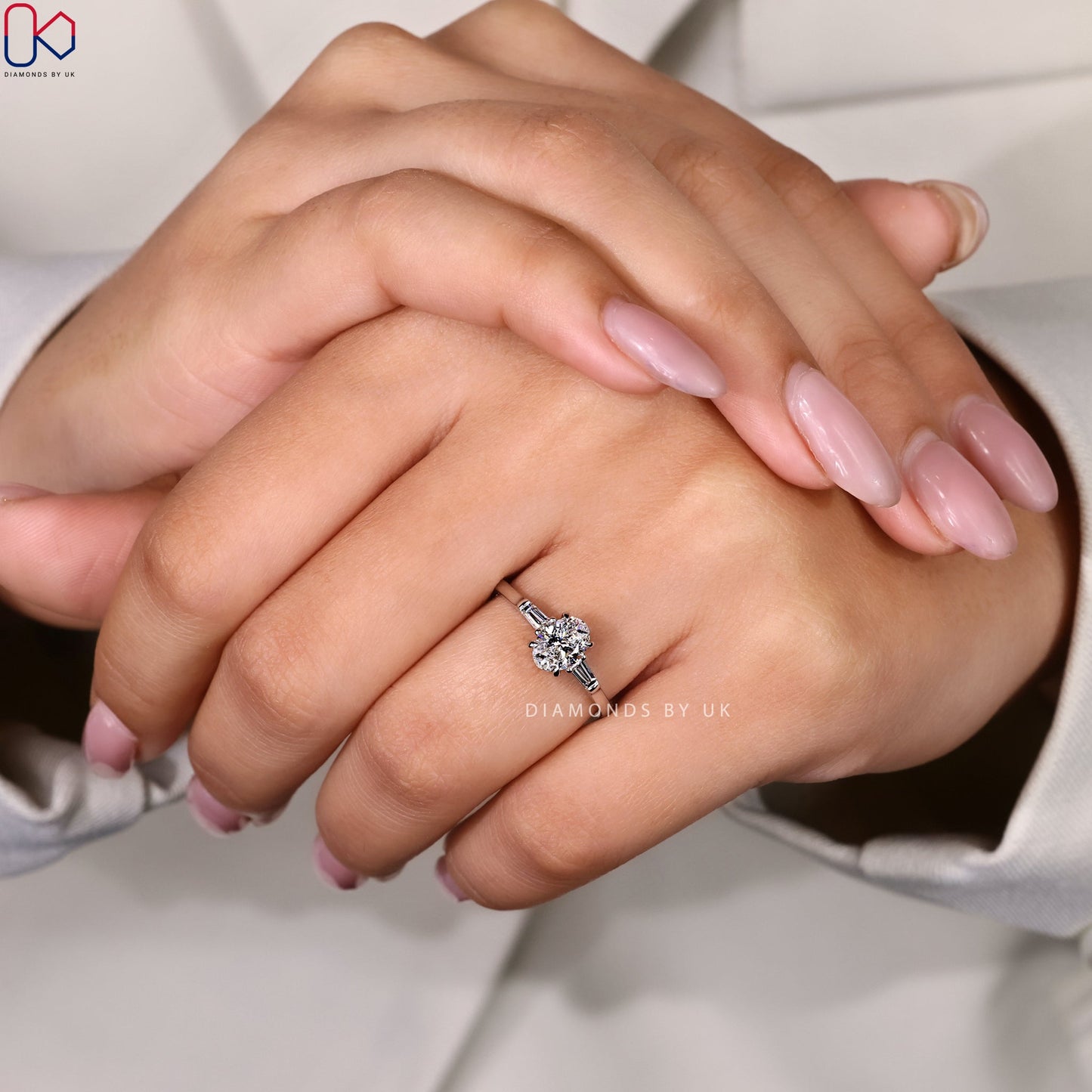 3 Stone Diamond Ring With Oval And Tapered Baguette Stone