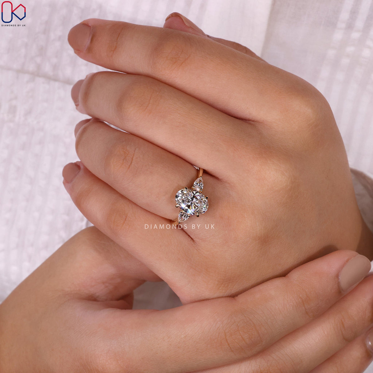 3 Stone Engagement Ring - Oval and Pear Diamond