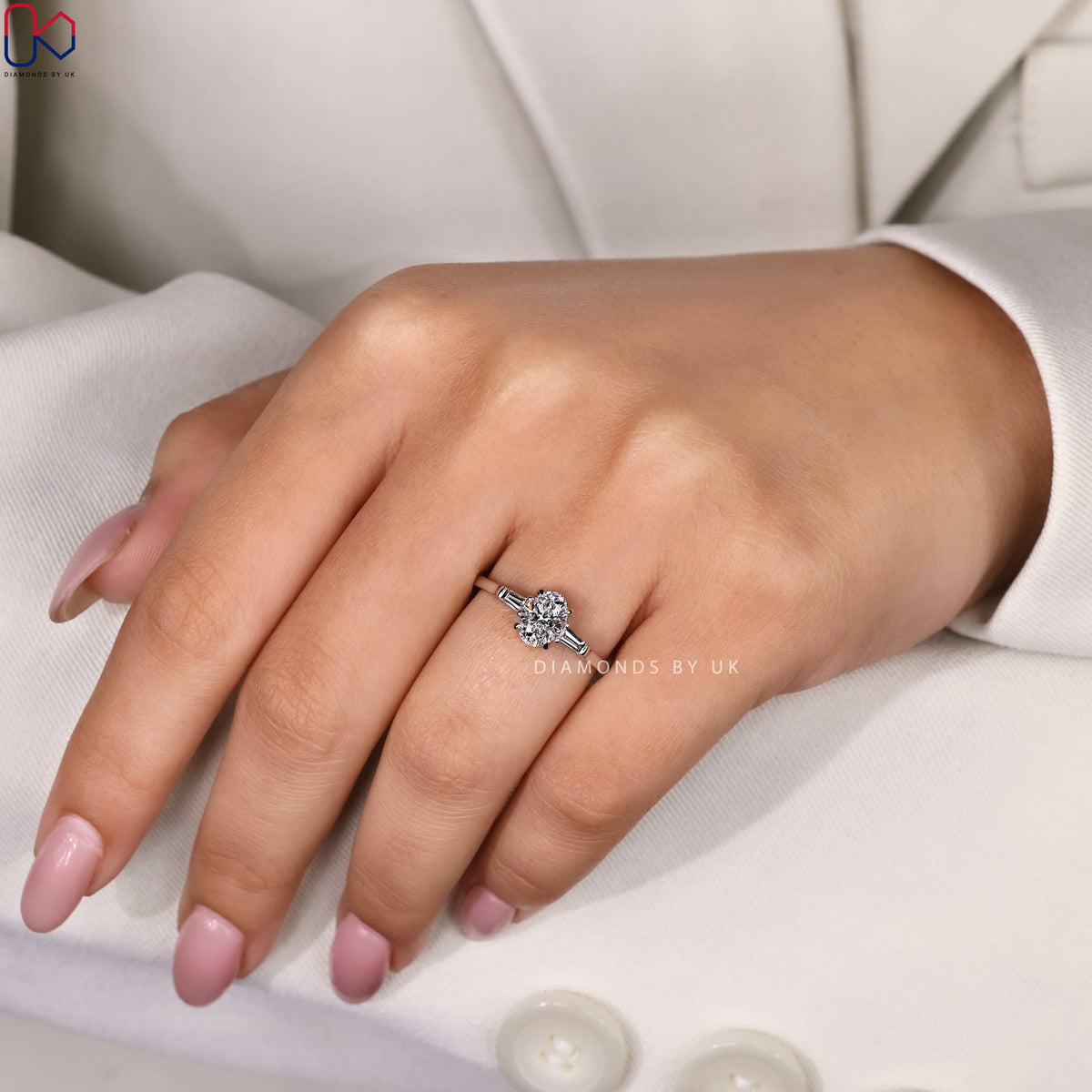3 Stone Diamond Ring With Oval And Tapered Baguette Stone