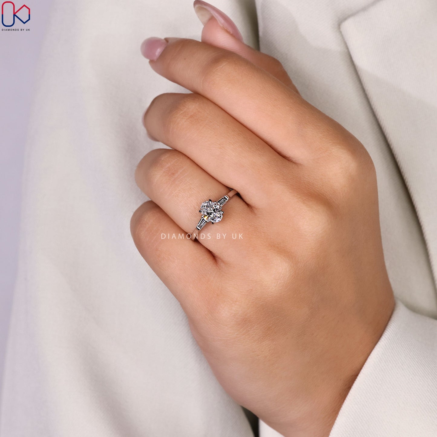 3 Stone Diamond Ring With Oval And Tapered Baguette Stone