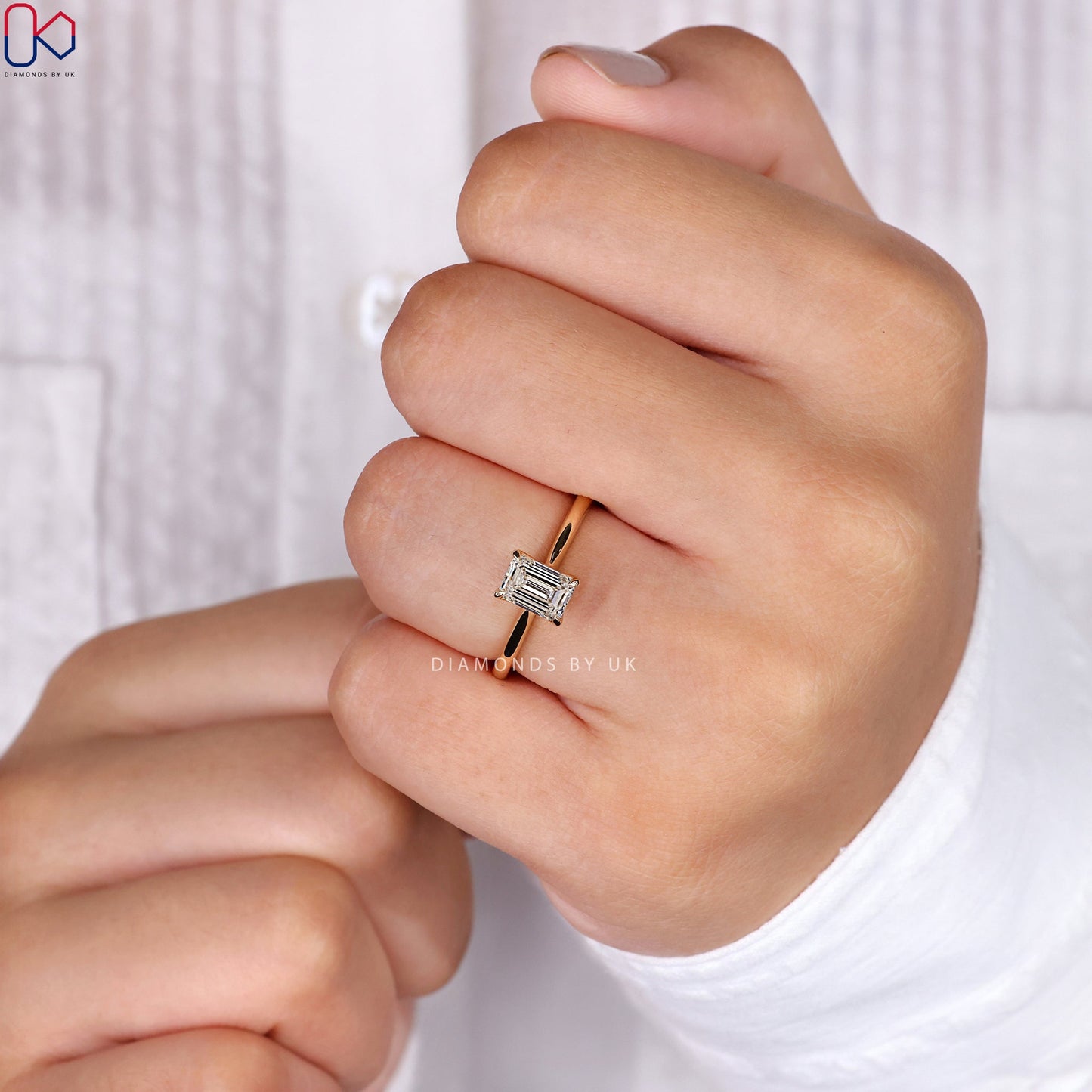 Emerald Cut Diamond Ring in Yellow Gold Setting
