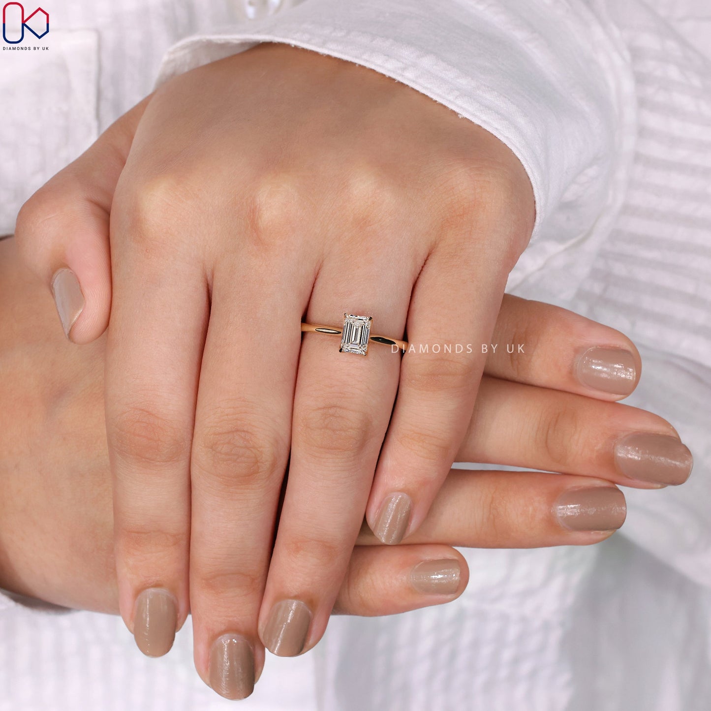 Emerald Cut Diamond Ring in Yellow Gold Setting