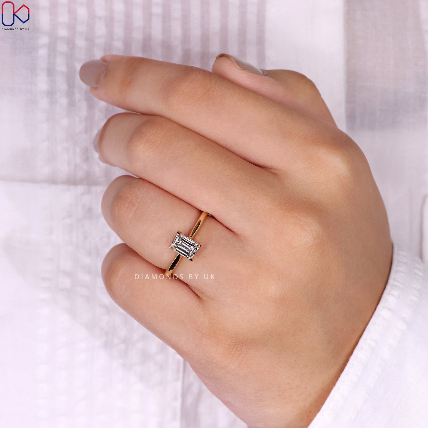 Emerald Cut Diamond Ring in Yellow Gold Setting