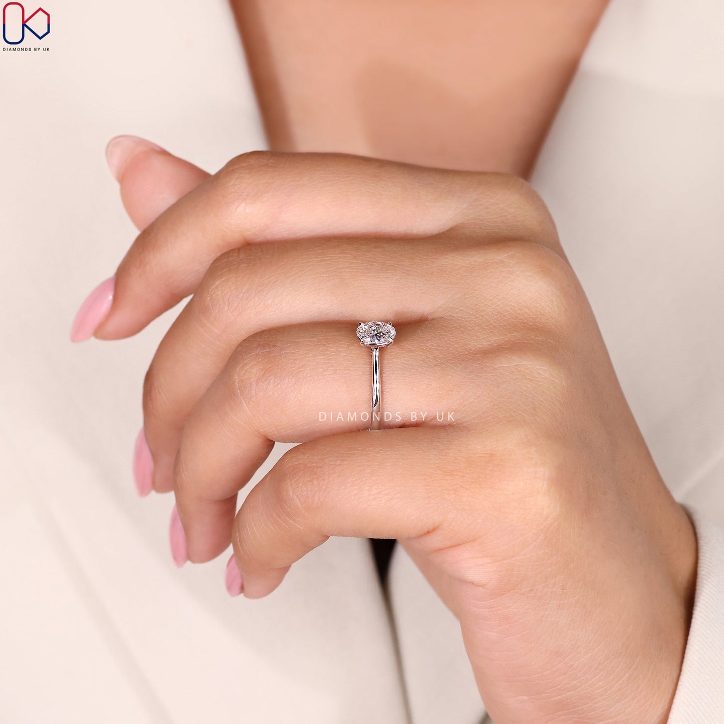 Solitaire Oval Cut Diamond Ring with Cathedral Setting