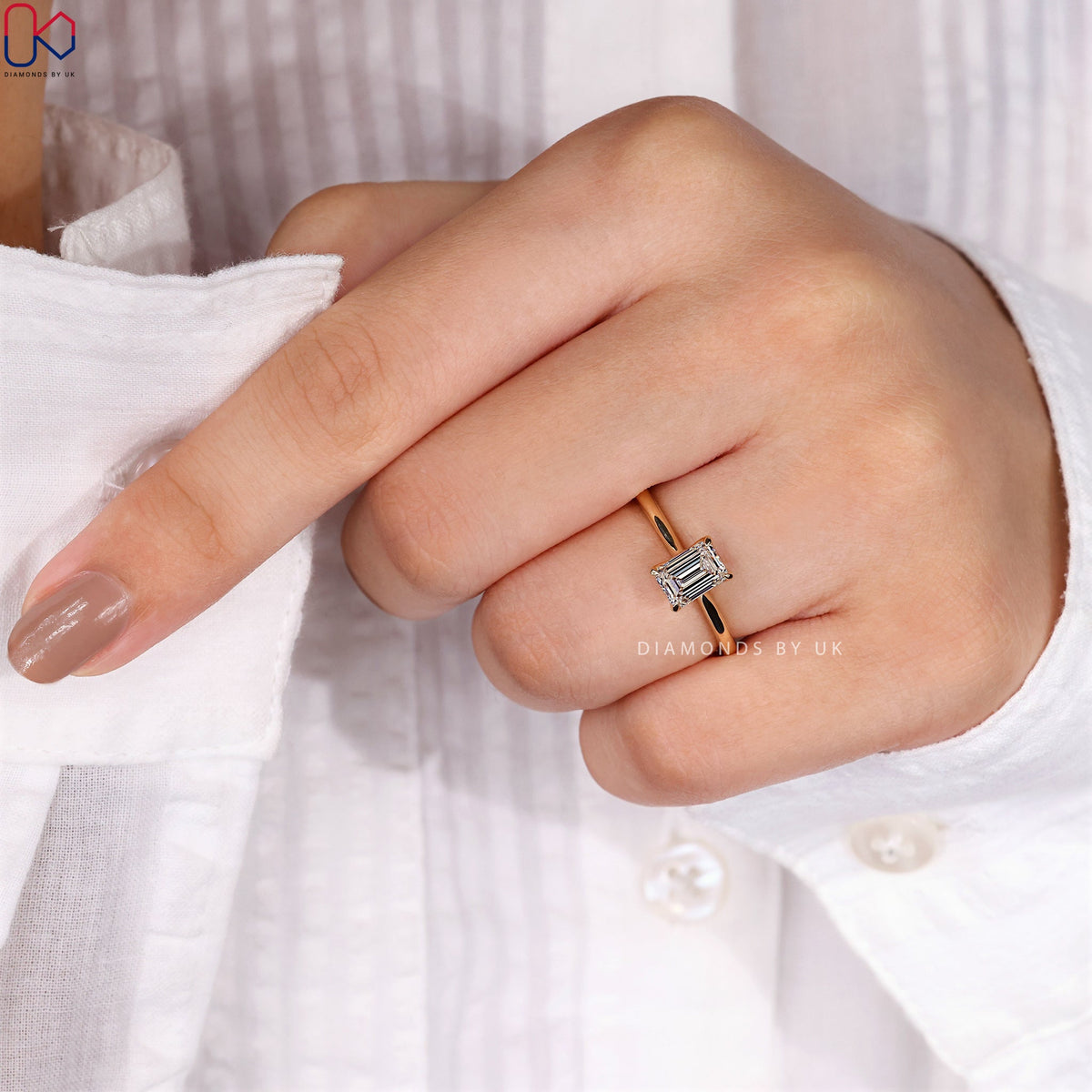 Emerald Cut Diamond Ring in Yellow Gold Setting