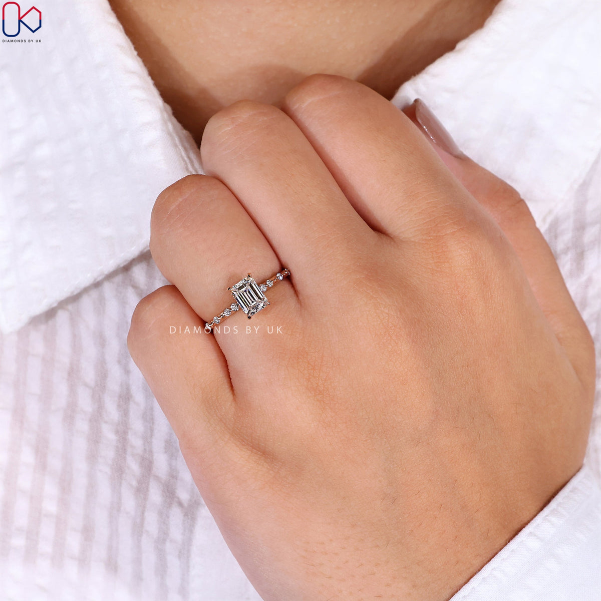Emerald Cut Engagement Ring With Distance Pave Band