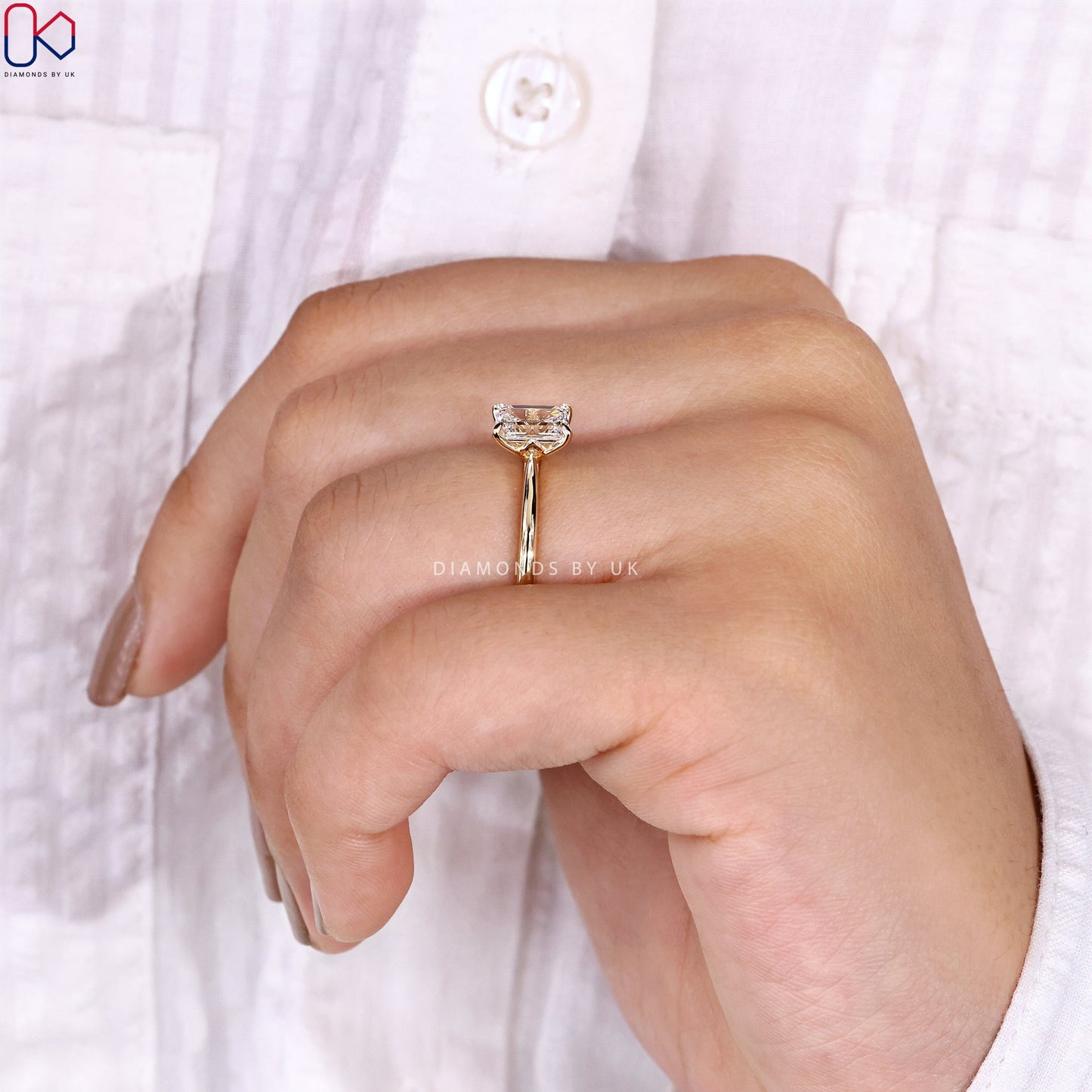 Emerald Cut Diamond Ring in Yellow Gold Setting