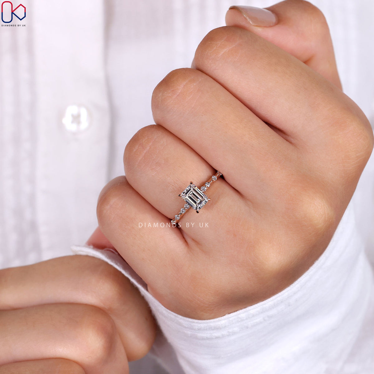 Emerald Cut Engagement Ring With Distance Pave Band