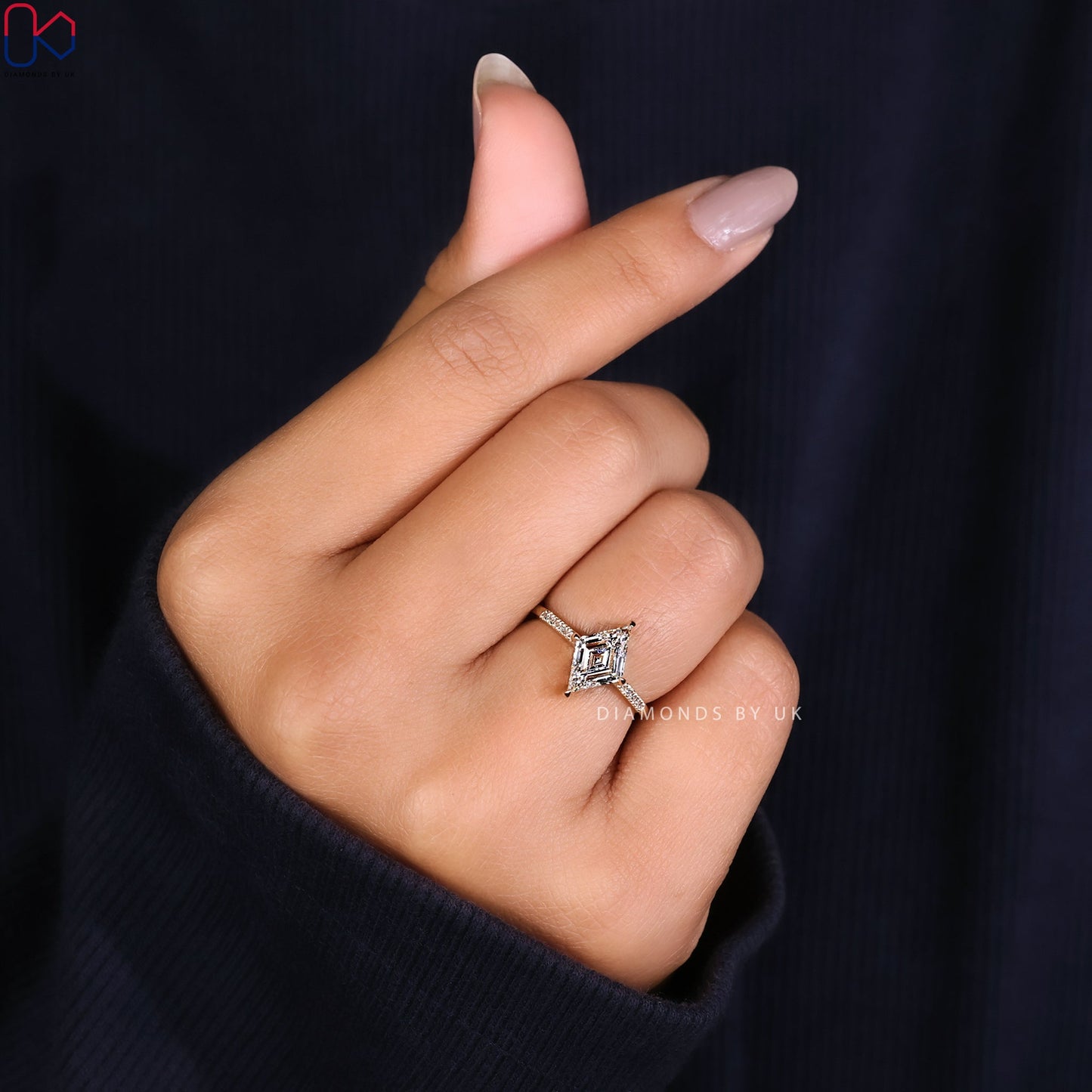 Lozenge Cut Diamond Ring With Compass prong
