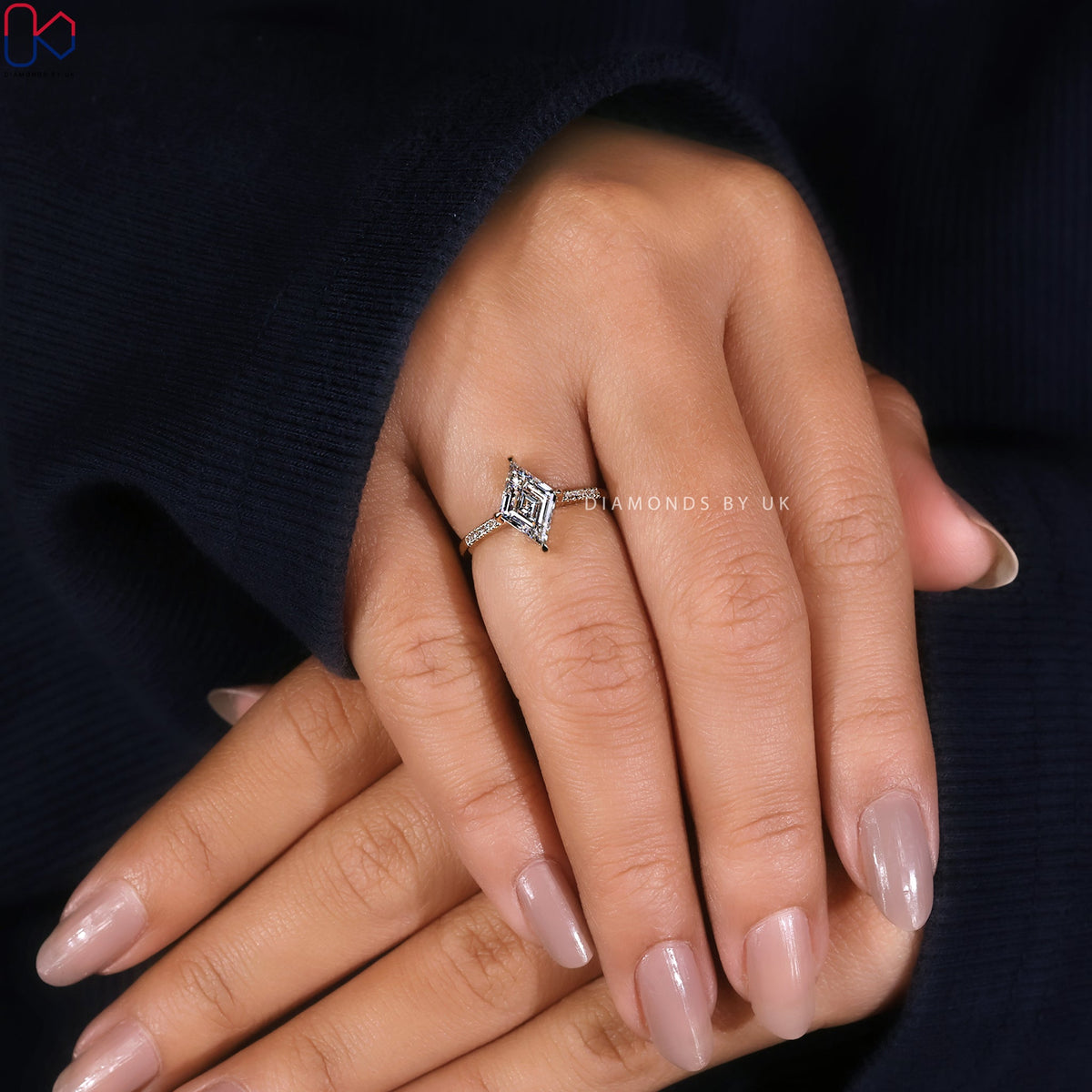 Lozenge Cut Diamond Ring With Compass prong