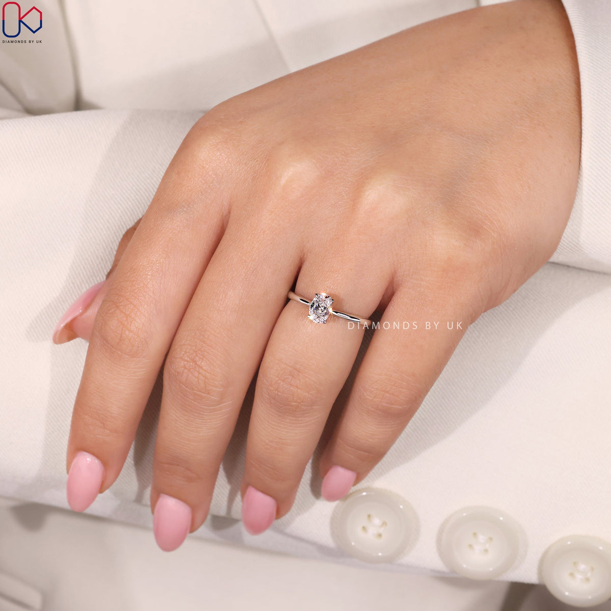 Solitaire Oval Cut Diamond Ring with Cathedral Setting