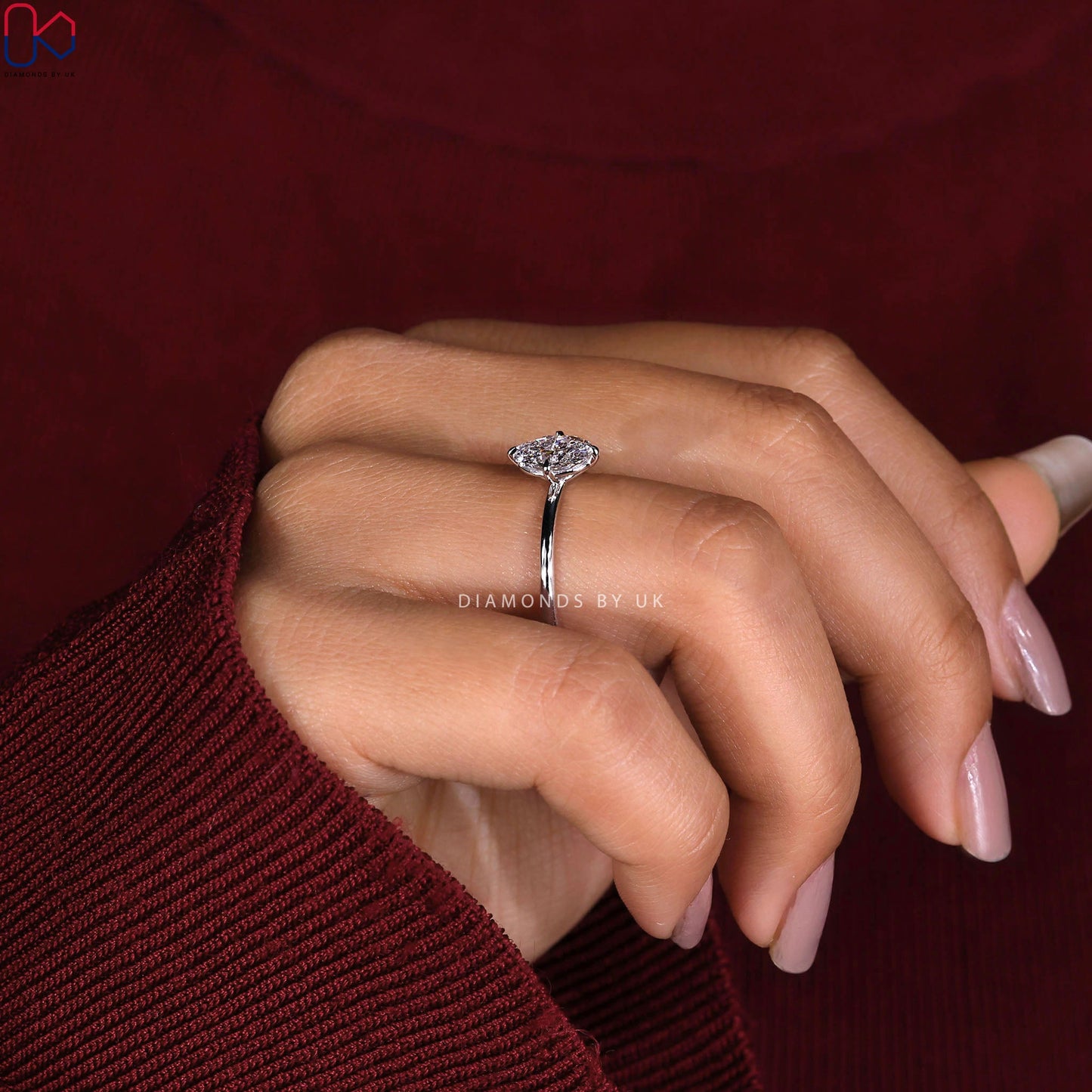 Oval Solitaire Engagement Ring In White Gold