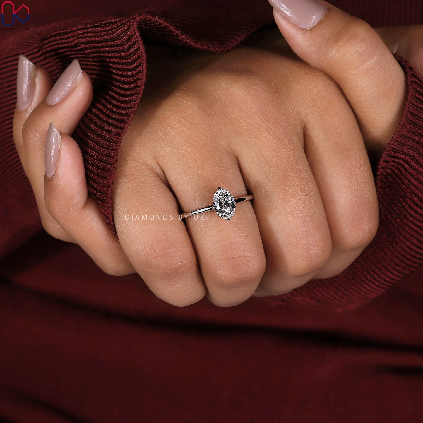 Oval Solitaire Engagement Ring In White Gold