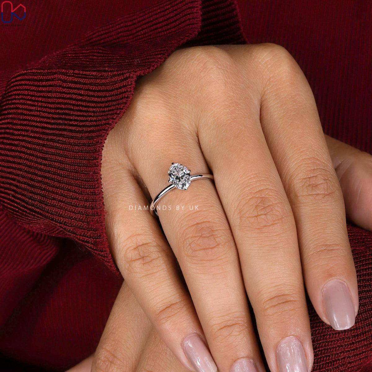 Oval Solitaire Engagement Ring In White Gold