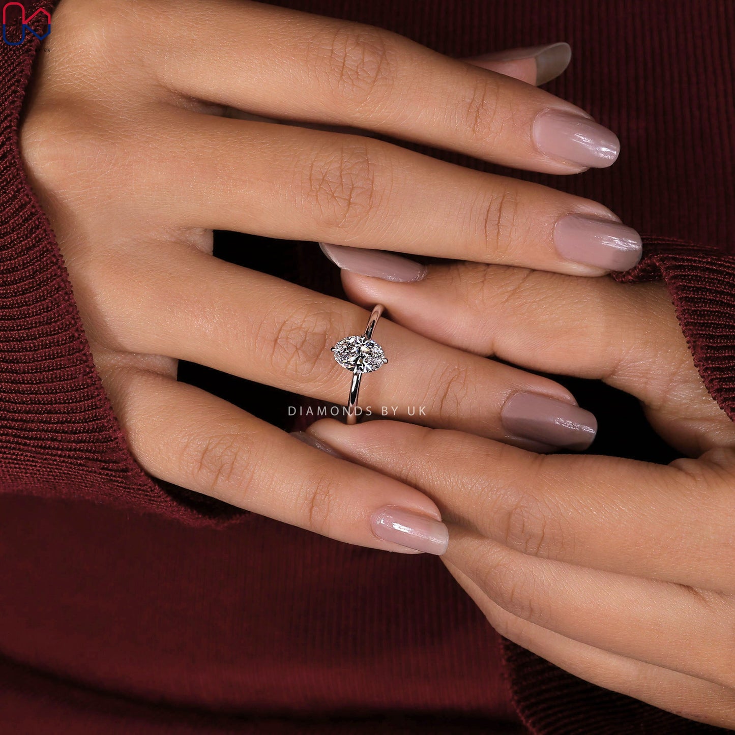 Oval Solitaire Engagement Ring In White Gold