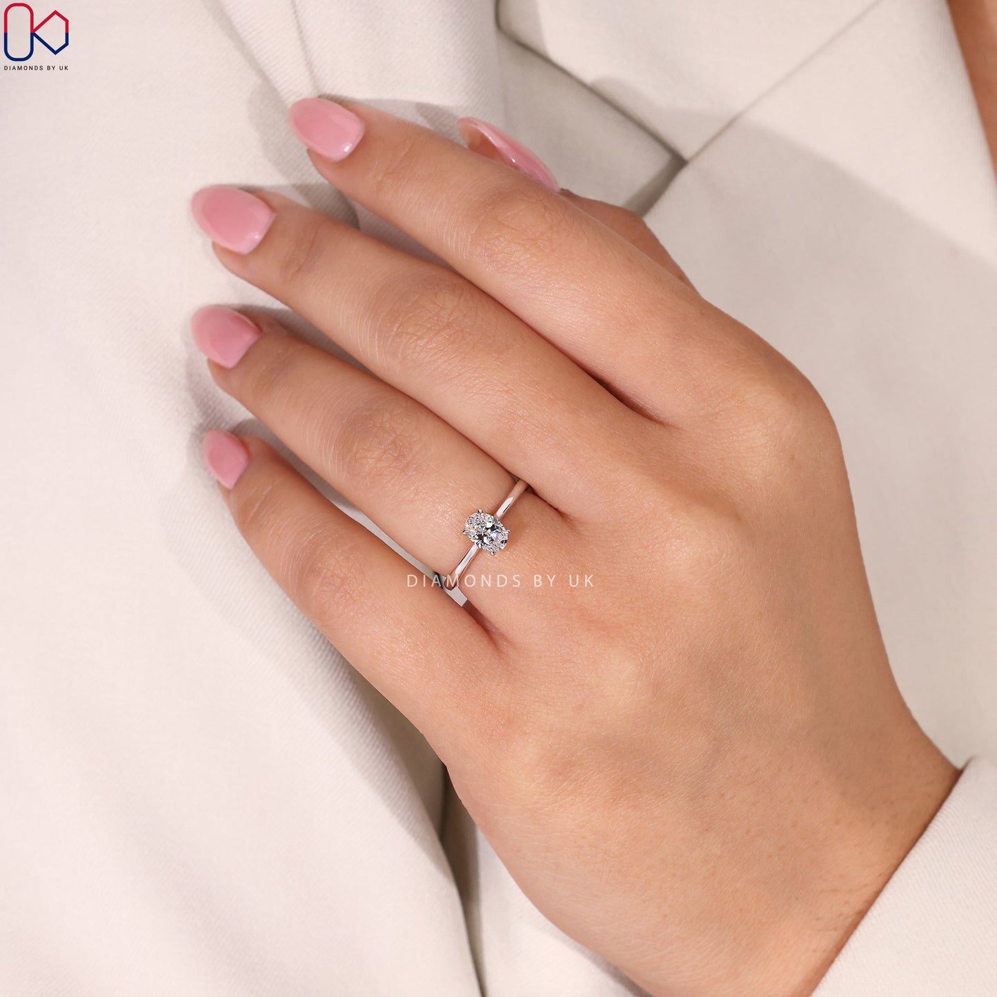 Solitaire Oval Cut Diamond Ring with Cathedral Setting