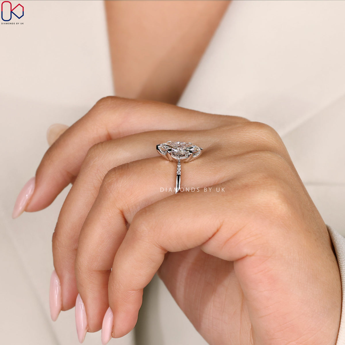 Marquise Diamond Engagement Ring with Round Side Accents