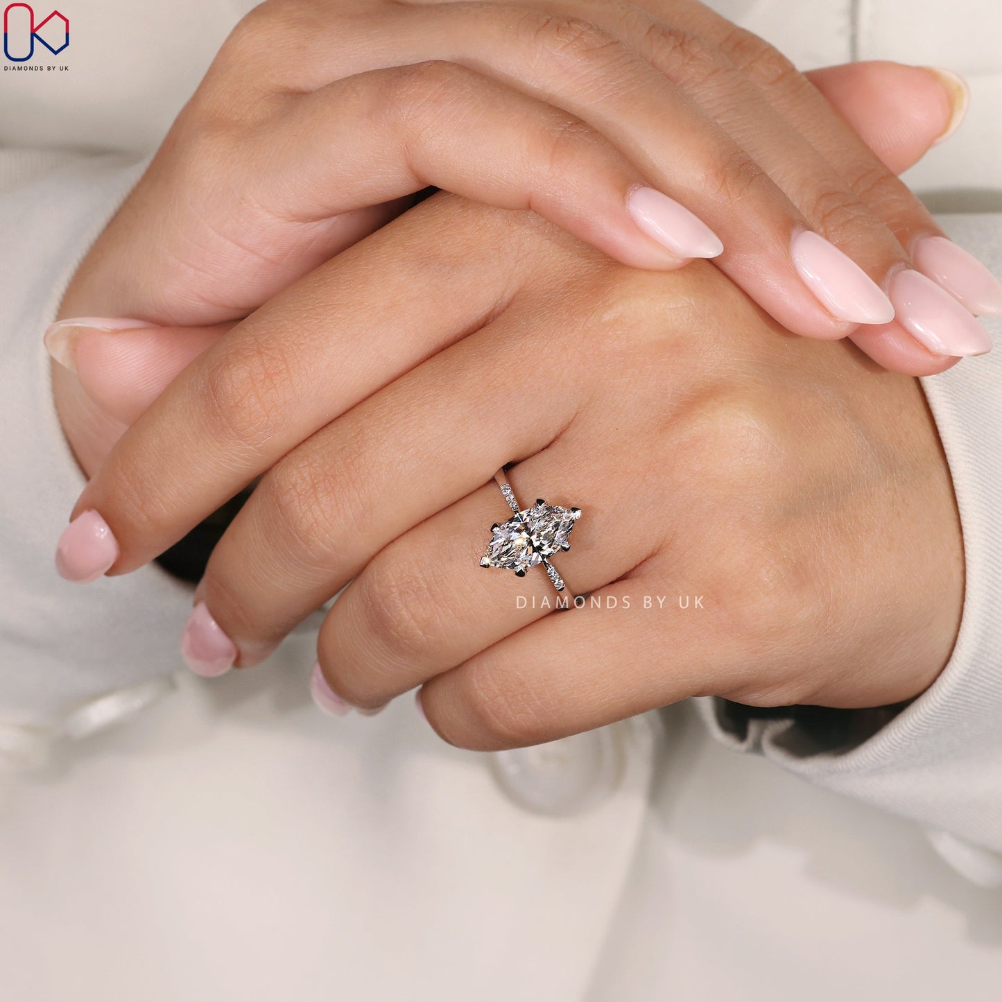 Marquise Diamond Engagement Ring with Round Side Accents