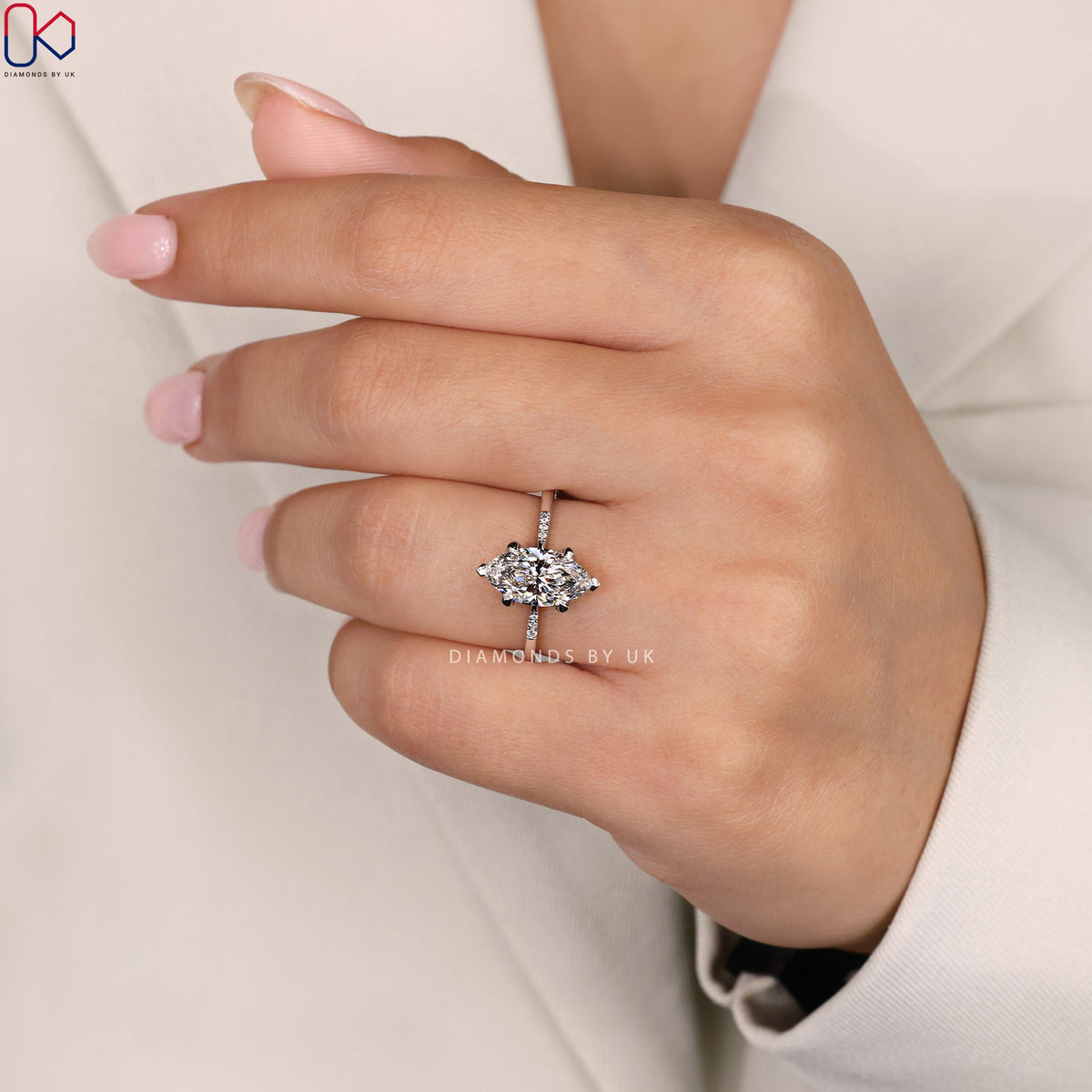 Marquise Diamond Engagement Ring with Round Side Accents