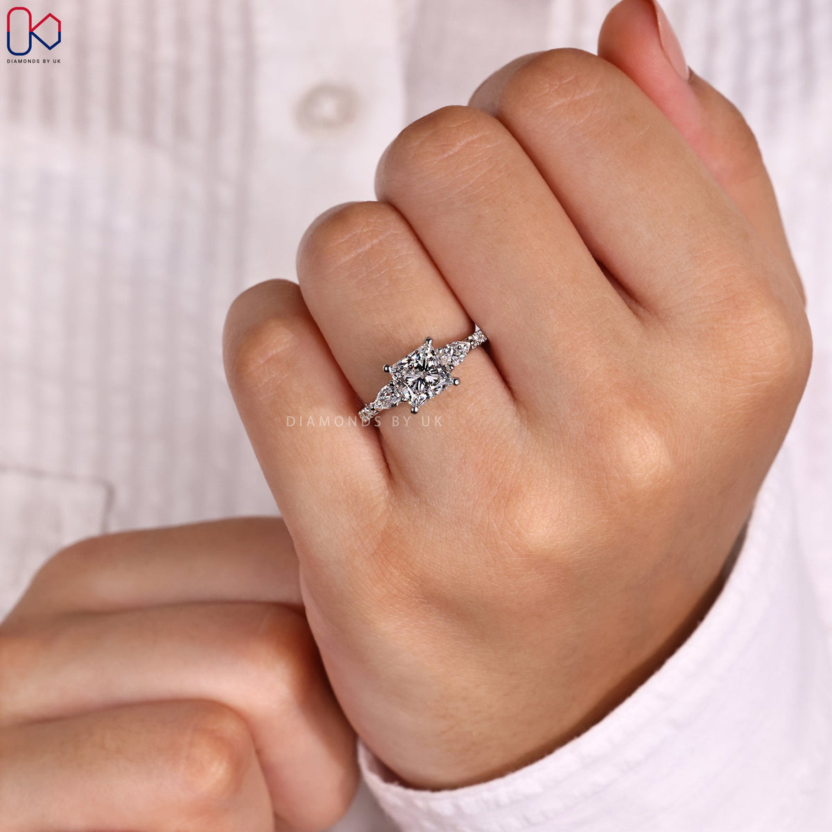 Princess and Pear Cut 3 Stone Ring