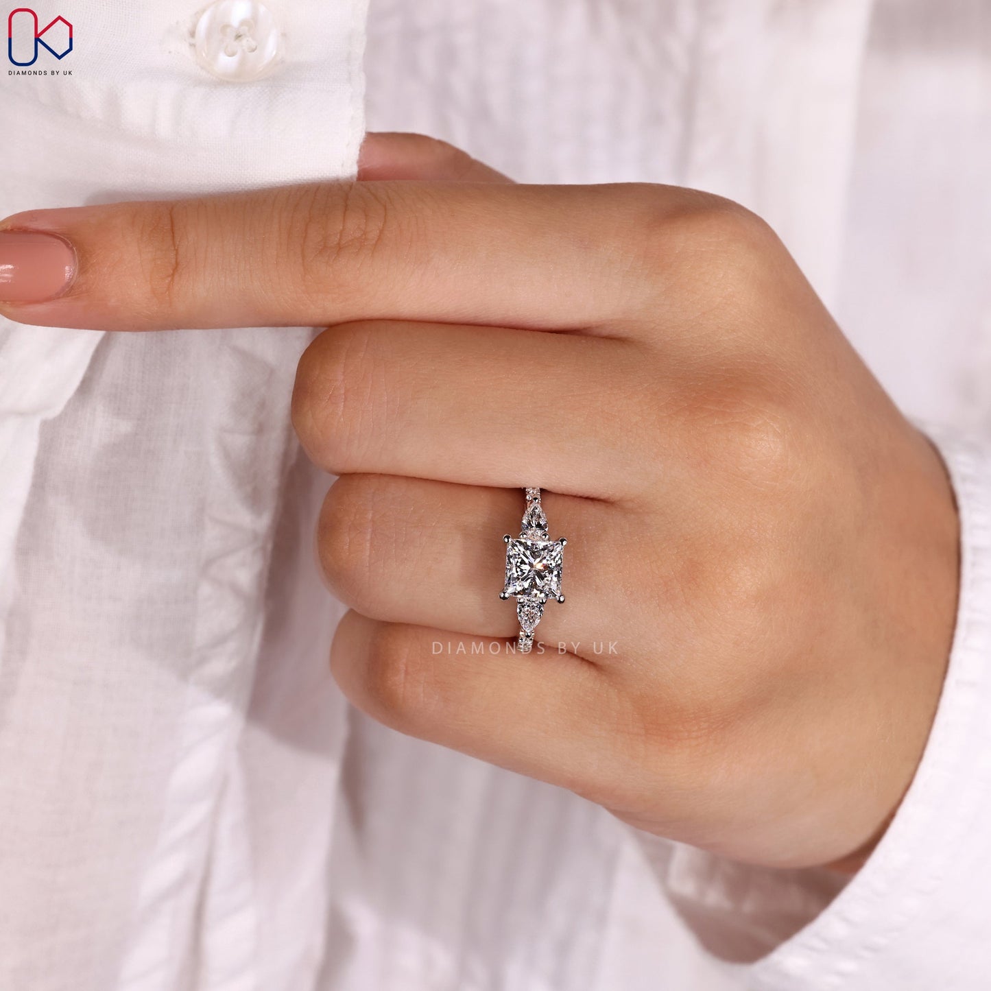 Princess and Pear Cut 3 Stone Ring