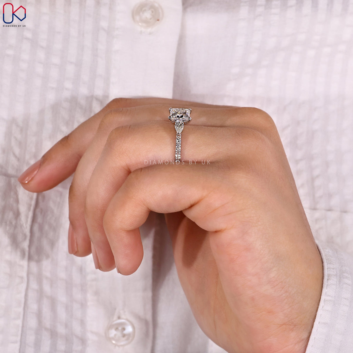 Princess and Pear Cut 3 Stone Ring