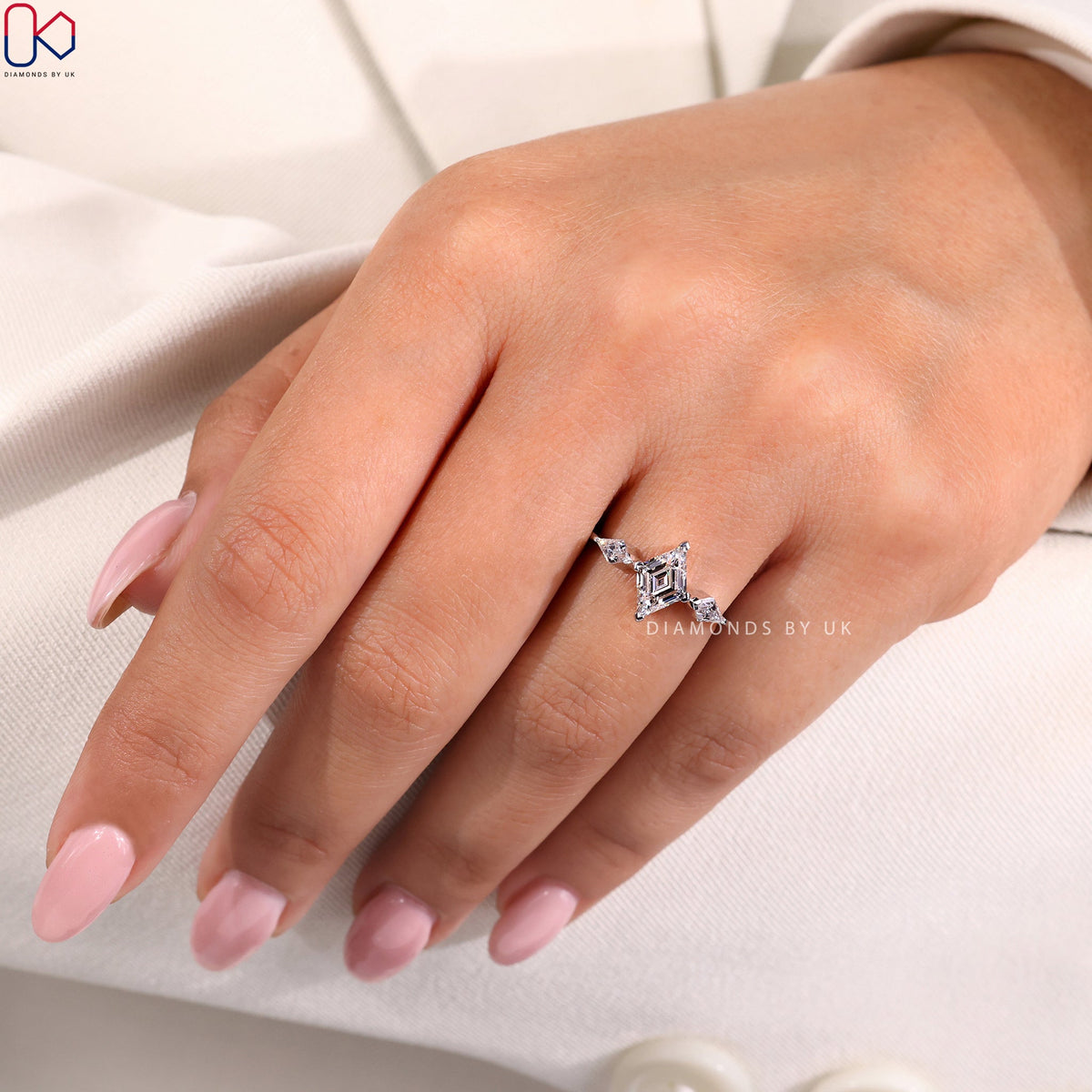 Lozenge Cut Diamond Ring With Kite Side Stones